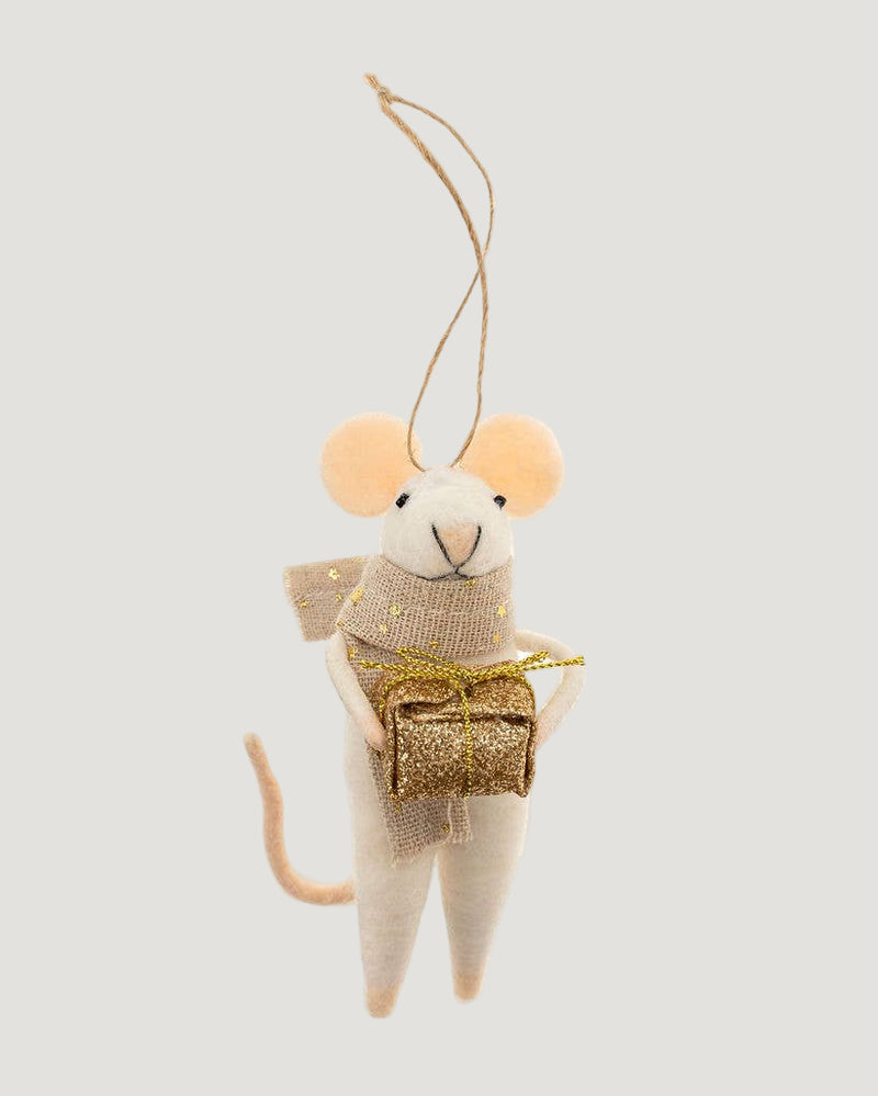 Decorative mouse ornament holding a gold gift box on a white background