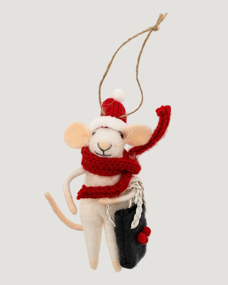 Decorative mouse ornament with a red scarf and hat on a white background
