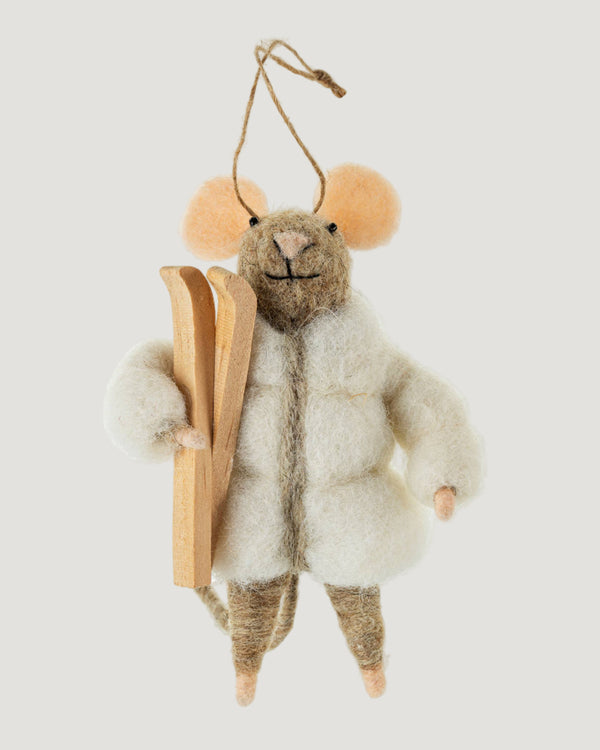 Plush mouse ornament with a book on a white background