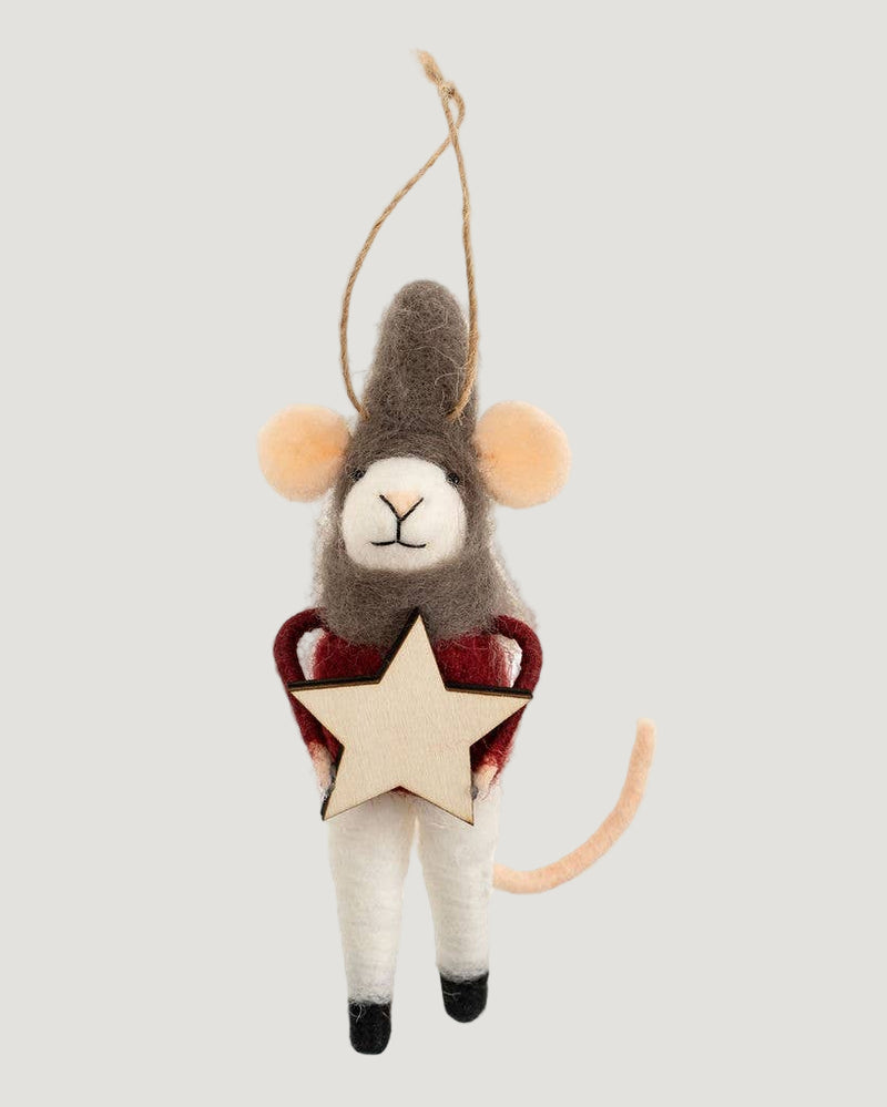 Decorative mouse ornament holding a star on a white background